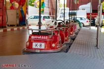 Pfingstkirmes 2023 - Bergisch Gladbach - Bilder - Gegenüber vom Break Dance steht ein Kinderscooter. • © ummet-eck.de - Silke Schön